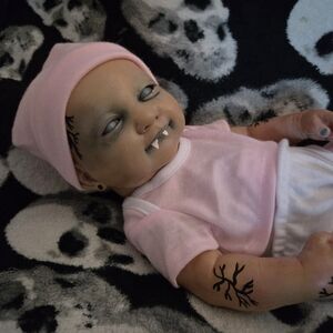 Vampire/zombie Baby Doll Prop!